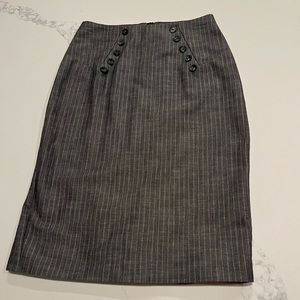 Pin stripped pencil skirt with fluttering back